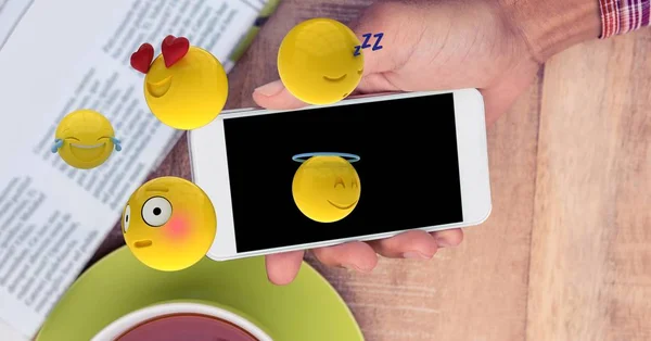 Emojis βγαίνει από το smartphone — Φωτογραφία Αρχείου