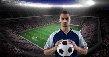 Kendine güvenen oyuncu futbol topu karşı Stadyumu