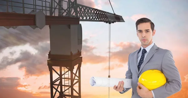 Architect holding hardhat — Stock Photo, Image