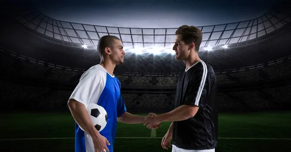 Soccer players shaking hands