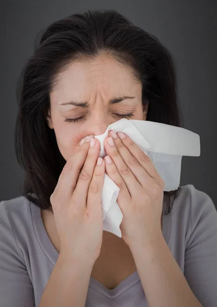 Woman crying into tissue Royalty Free Stock Images