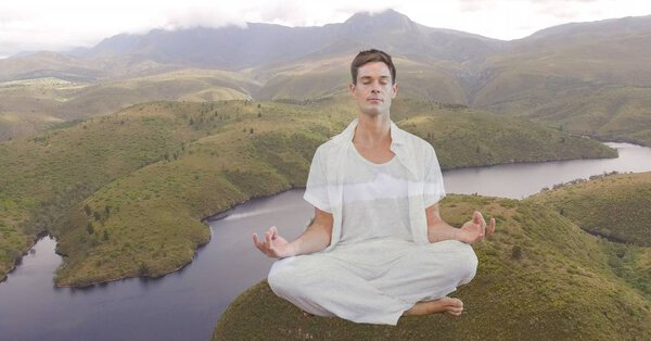 Double exposure man meditating