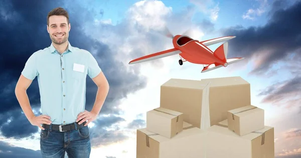 Sorrindo homem de entrega com caixas e avião — Fotografia de Stock