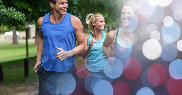 Mutlu insanlar Park'ta jogging — Stok fotoğraf