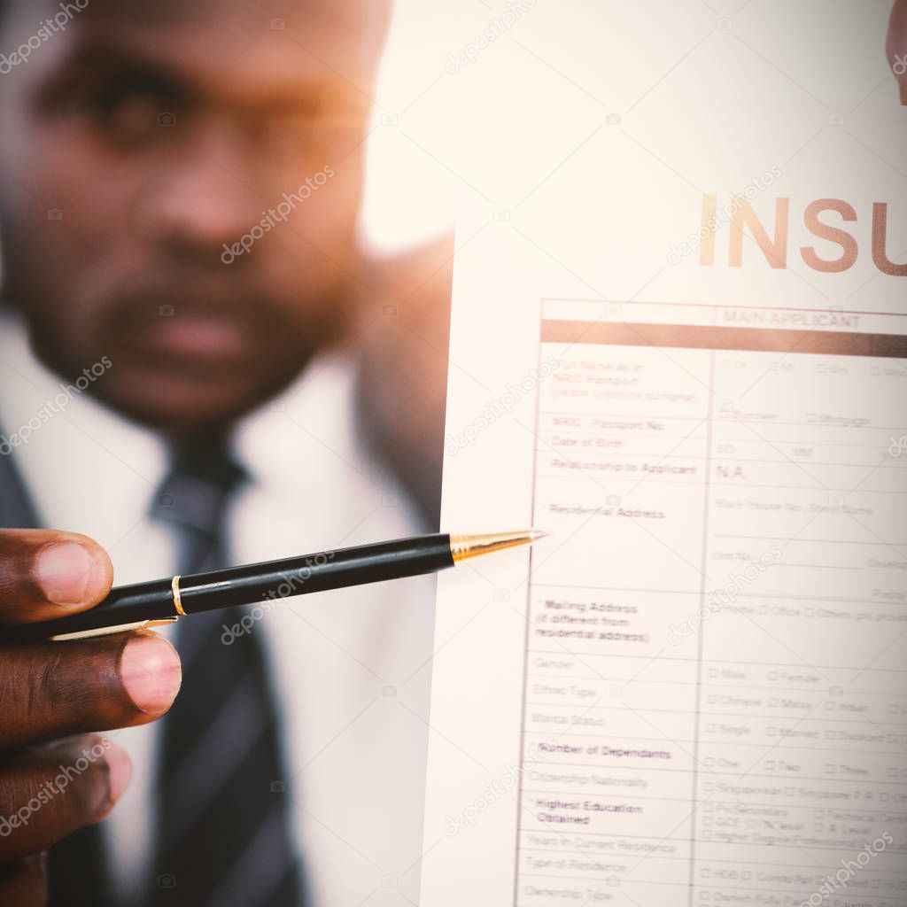 Businessman showing insurance document