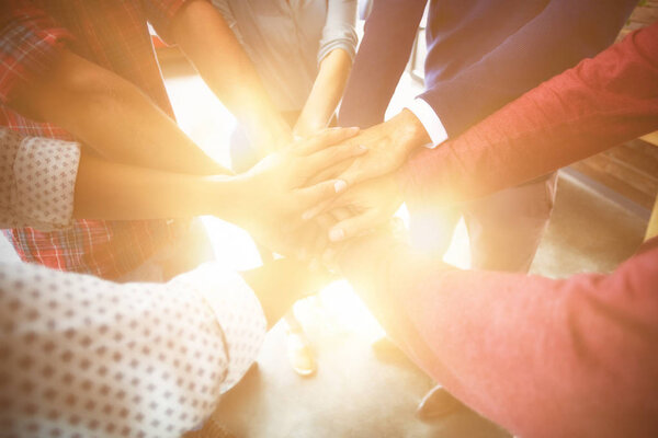 Team of businesspeople forming hand stack