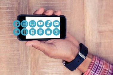 Hareket eden telefon simgeleri ile gösterilen el