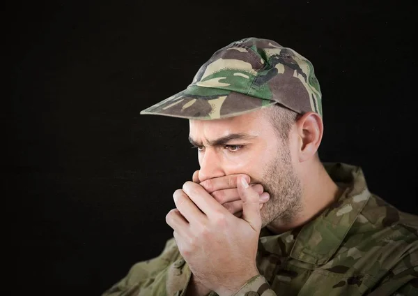 Worried soldier foreground with cap — Stock Photo, Image