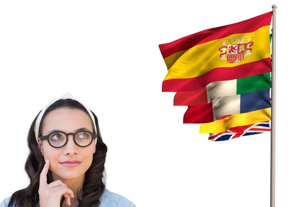 Fő nyelv flags közelében szemüveg gondolkodó fiatal nő — Stock Fotó