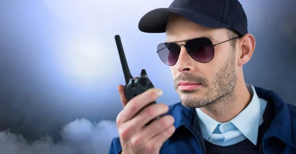 Hombre de seguridad afuera con nubes —  Fotos de Stock