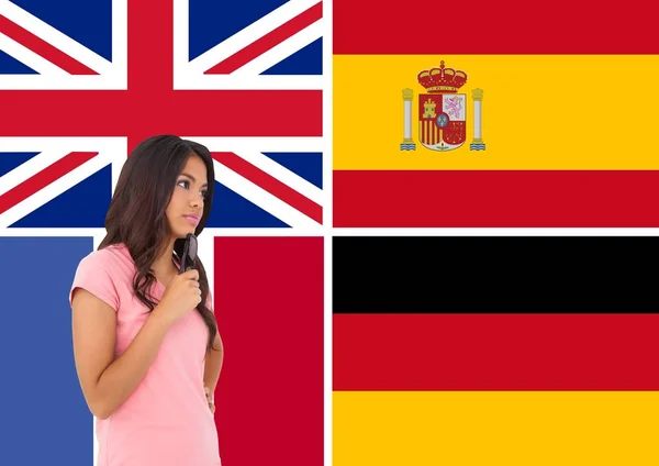 Main language flags around young woman with glasses on the hand — Stock Photo, Image