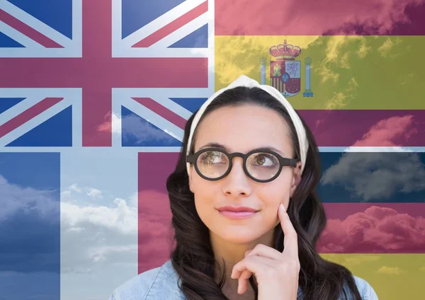 main language flags overlap with sky around thoughtful woman