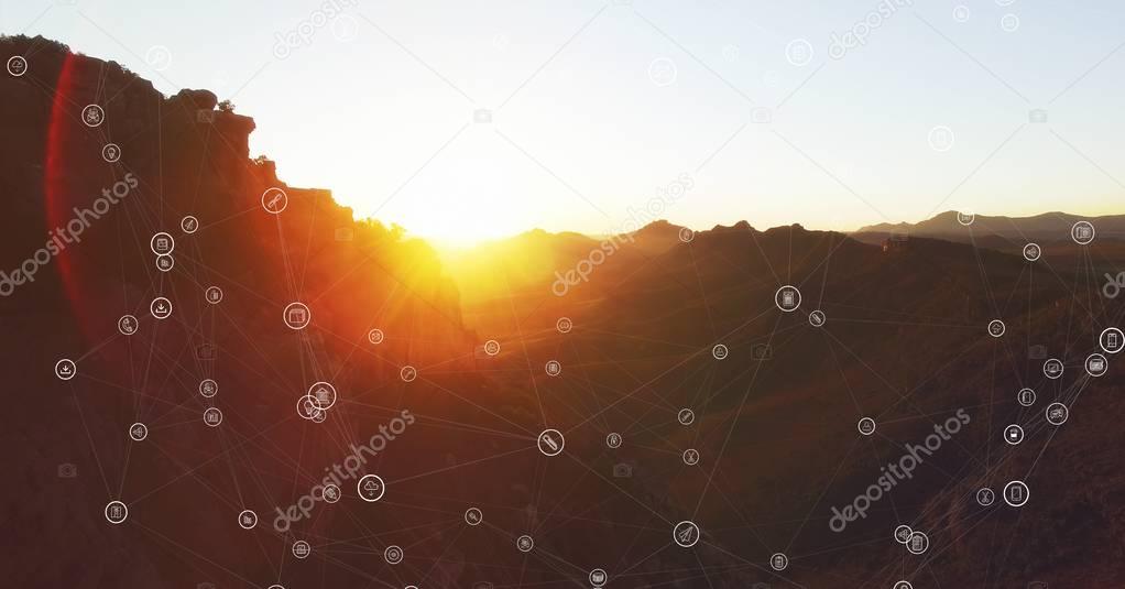 White network against mountain and sunset