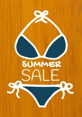 Beyaz yaz satış metin ve mavi bikini ahşap karşı