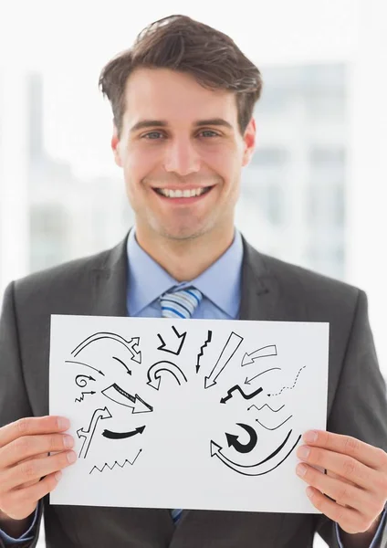 Scarabocchi freccia grigia su carta tenuta da uomo d'affari sorridente — Foto Stock
