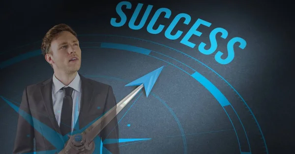 Digitale Composietbeeld van zakenman permanent door succes tekst met kompas — Stockfoto