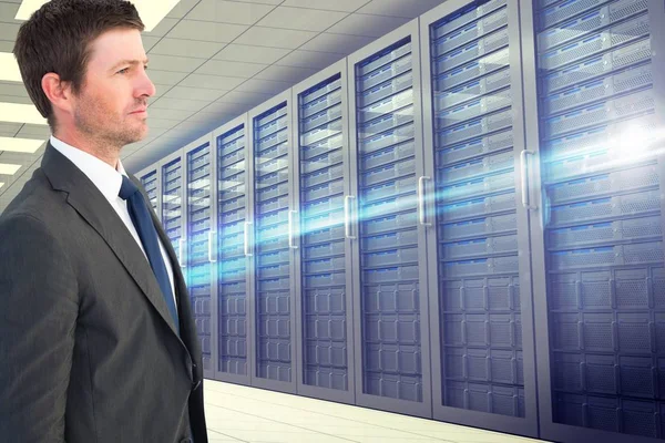 Side view of businessman holding on against database background Stock Image