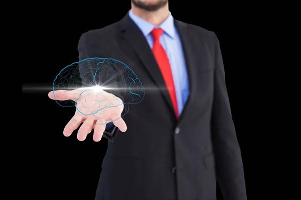 Brain on hand's businessman against black background — Stock Photo, Image