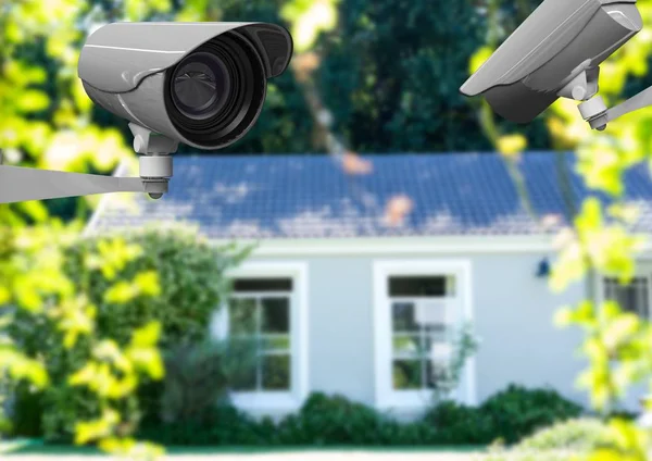 2 CCTV looking after the house and a blurred background — Stock Photo, Image