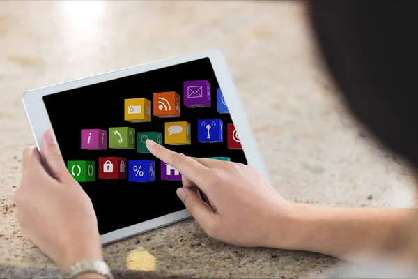 Close up of hands using tablet with graphics on screen — Stock Photo, Image