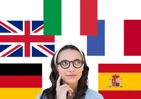 Fő nyelv flags körül gondoltam, fiatal nő — Stock Fotó