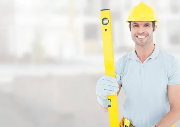 Construction Worker with spirit level — Stock Photo, Image