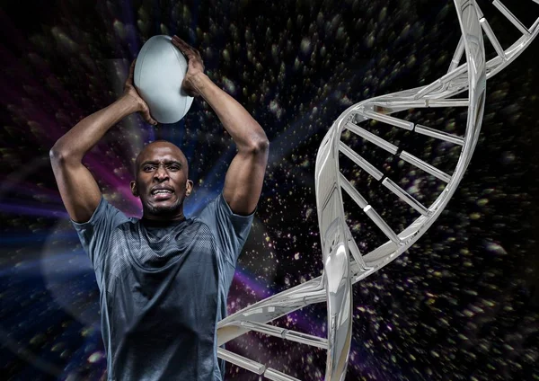 Rugby-Spieler mit Ball, eiserner DNA-Kette und schwarzem Hintergrund — Stockfoto