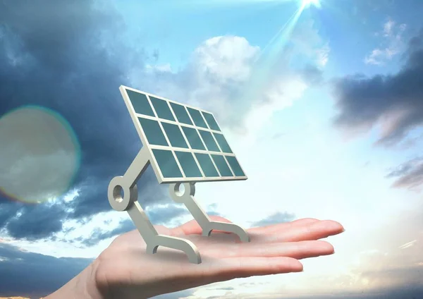 Цифрове зображення сонячної панелі на руці проти неба — стокове фото