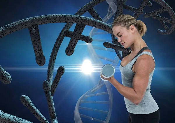 Sporty woman with dna chain and blue background — Stock Photo, Image