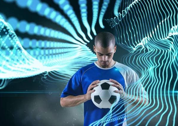 Fotbalový hráč s míčem s modrými světly — Stock fotografie