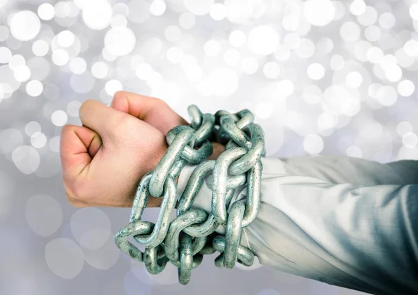 Hands in chains with sparkling light bokeh background — Stock Photo, Image