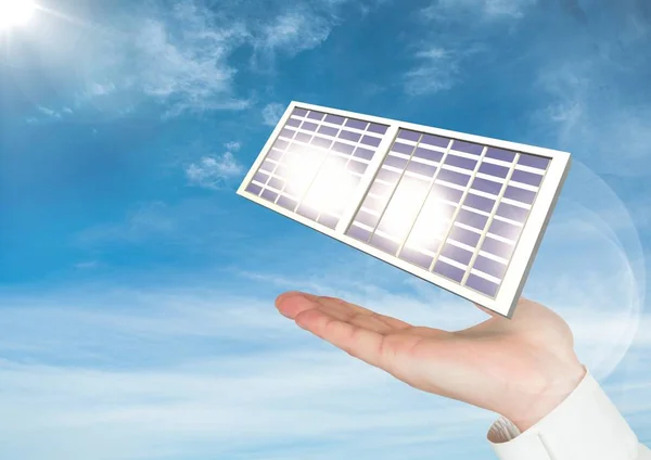 Cyfrowy obraz panel słoneczny na rękę przeciwko niebo — Zdjęcie stockowe