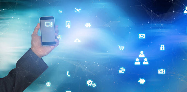 Hand of man holding mobile phone