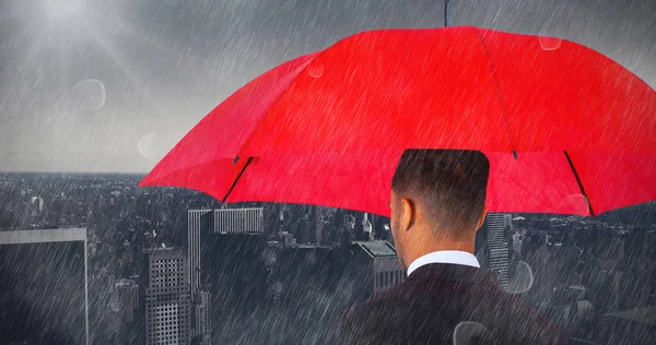 Podnikatel účetní červený deštník — Stock fotografie