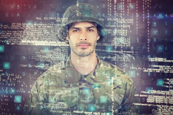 Composietbeeld van soldaat permanent — Stockfoto