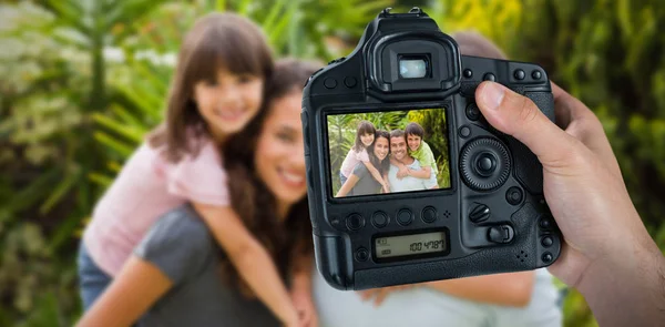 Camera with family on screen — Stock Photo, Image