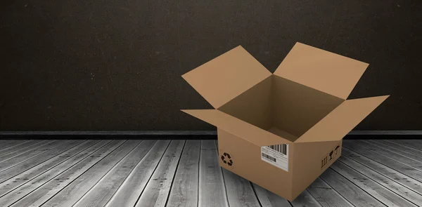 Caja de cartón marrón abierto contra habitación oscura — Foto de Stock