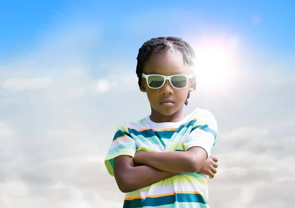 Boy in sunglasses arms folded — Stock Photo, Image