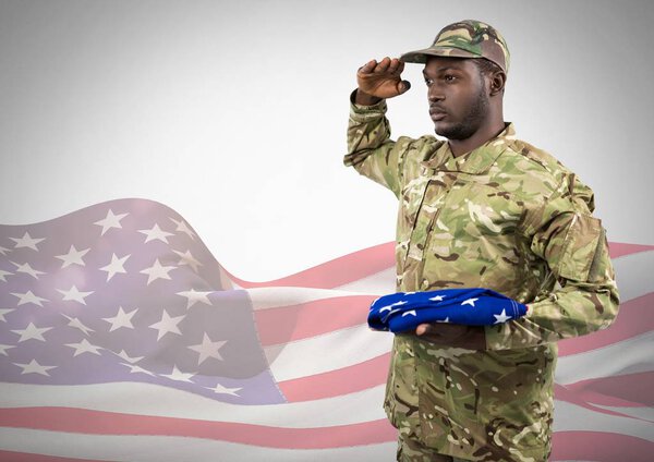 Black soldier holding an american flag 