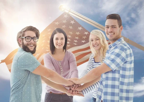 Happy friends putting their hands together — Stock Photo, Image