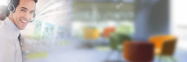 Customer service assistants  with headsets with bright office background — Stock Photo, Image