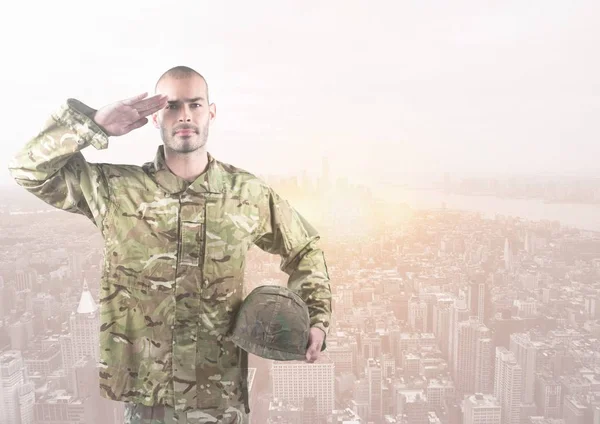 Soldier with hand in head in front of city buildings — Stock Photo, Image