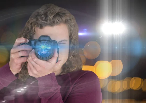Photographer man with long hair — Stock Photo, Image