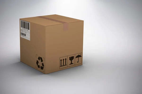 Кур'єрська коробка на сірому фоні — стокове фото