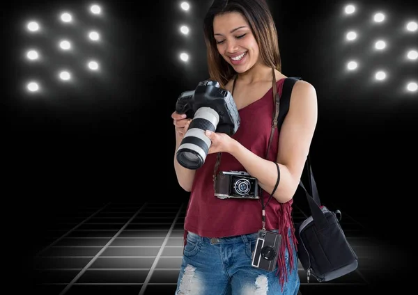 Photographer looking photos on camera — Stock Photo, Image