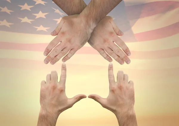 Manos haciendo una casa contra bandera americana — Foto de Stock