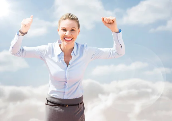 Business woman hands in air against sunny sky with flare