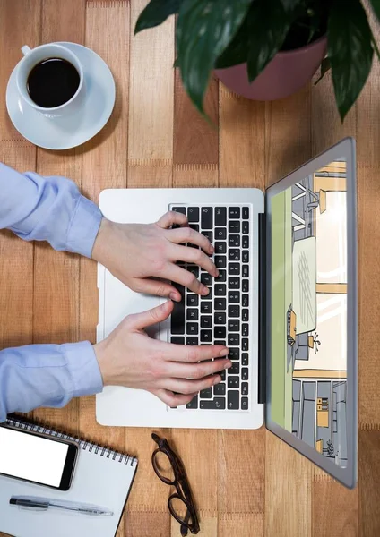 Bovenaanzicht van een bureau met laptop — Stockfoto