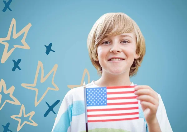 Niño sosteniendo bandera americana — Foto de Stock