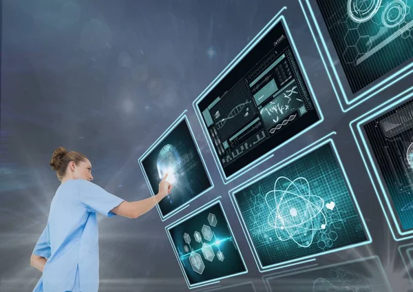 Médico mujer interactuando con interfaces médicas 3d —  Fotos de Stock